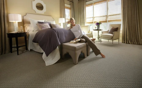 textured carpeting in bedroom